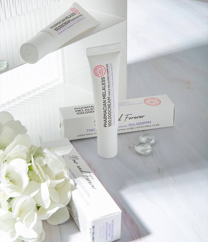 Pharmacian MELALESS 100,000 cream tubes and boxes with white flowers