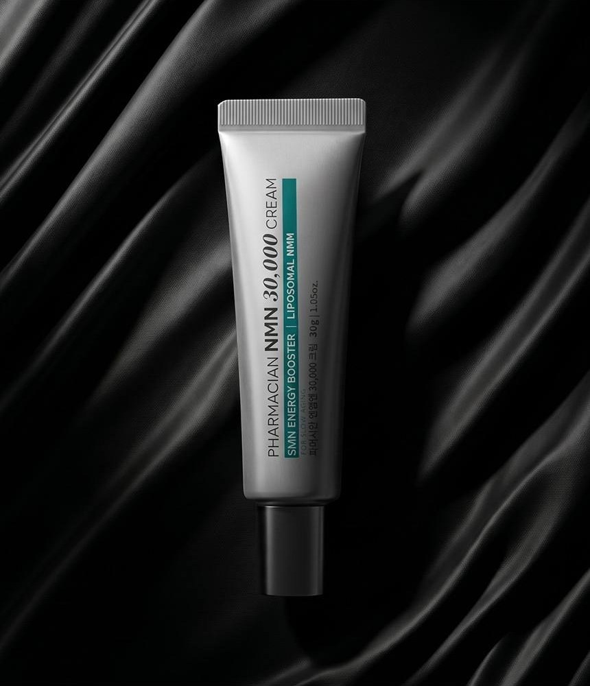 Pharmacian NMN30000 cream tube on dark silk
