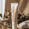 Pharmacian PDRN12000 cream 30 g tube on linen with dried botanicals Pharmacian PDRN12000 cream 30 g tube on linen with dried botanicals
