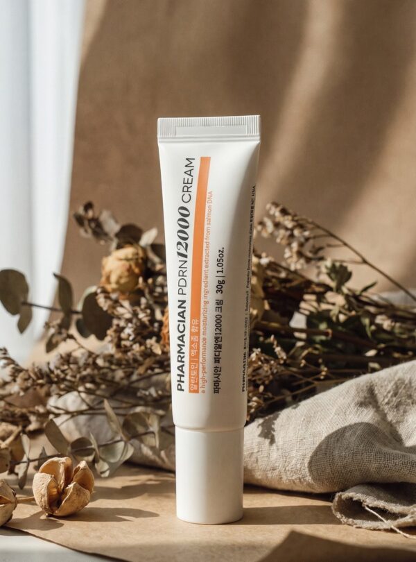 Pharmacian PDRN12000 cream 30 g tube on linen with dried botanicals Pharmacian PDRN12000 cream 30 g tube on linen with dried botanicals
